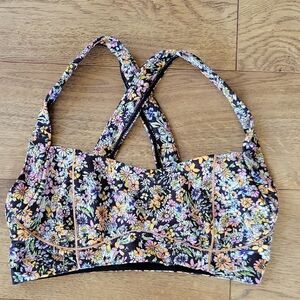 FP Movement by Free People Floral Crossback Sports Bra in Black and Pastel